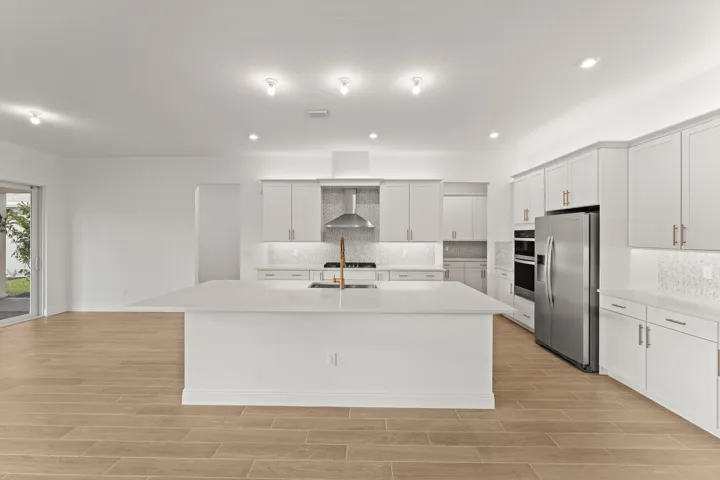 Stock photos represent builder's floorplan