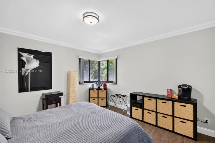 Corner Impact Glass Windows in the Second Bedroom Provide Lots of Natural Light