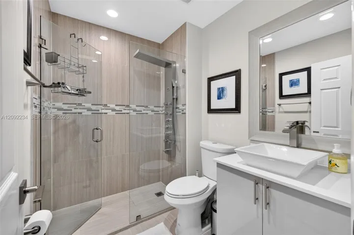 Third Floor Guest Bathroom Has a Sophisticated Heavy Frameless Glass Shower Entry