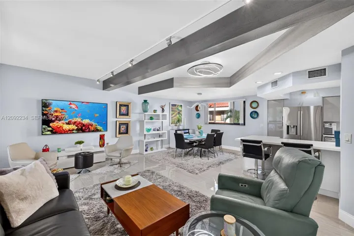 Gloss High-end Tile Throughout the Open Floor Plan Living Area