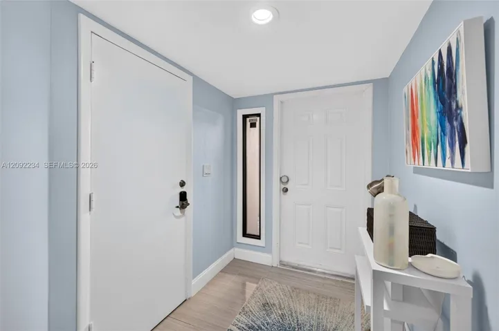 Digital Key Pads on the Garage Entry Door and the Downstairs Storage Closet Make Keys Obsolete