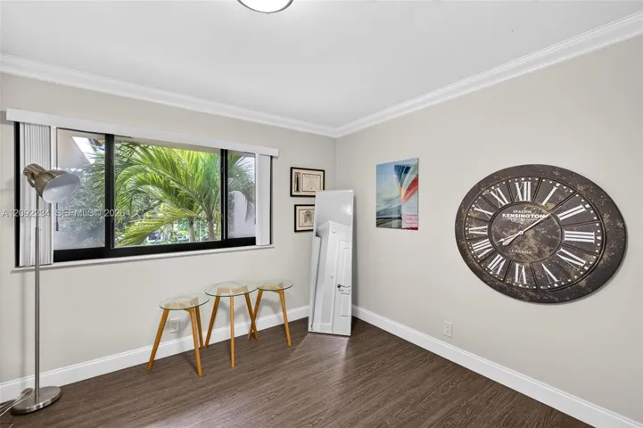 Impact Glass in the Third Bedroom Brightens the Room with Filtered Light