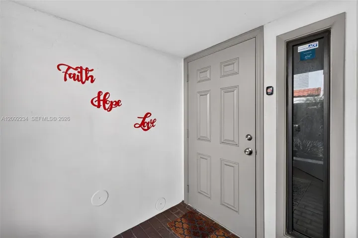 Hurricane Impact Front Entry Door and Sidelight Offer Added Safety