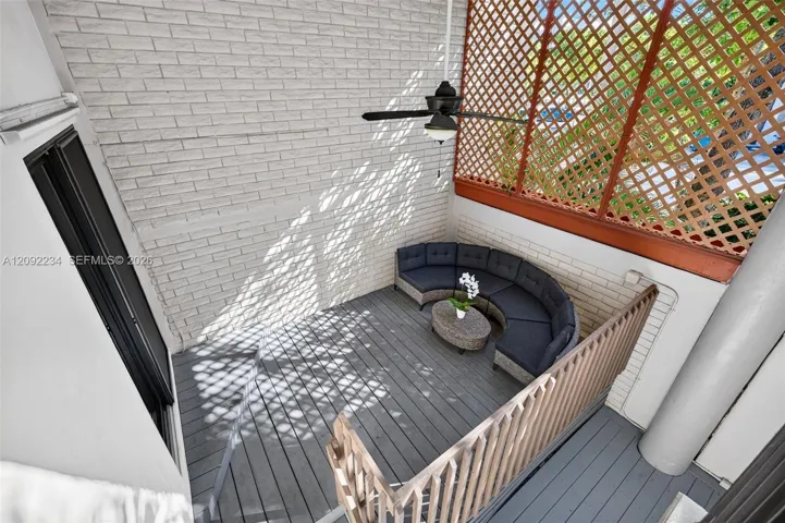 View from the Second Floor Balcony Shows the Privacy Lattice Wood Screen on the Deck