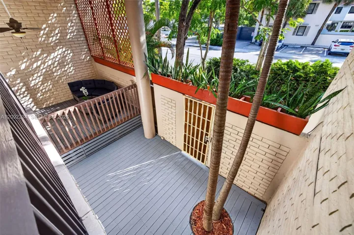 Second Floor Balcony Overlooks the Patio and Deck.