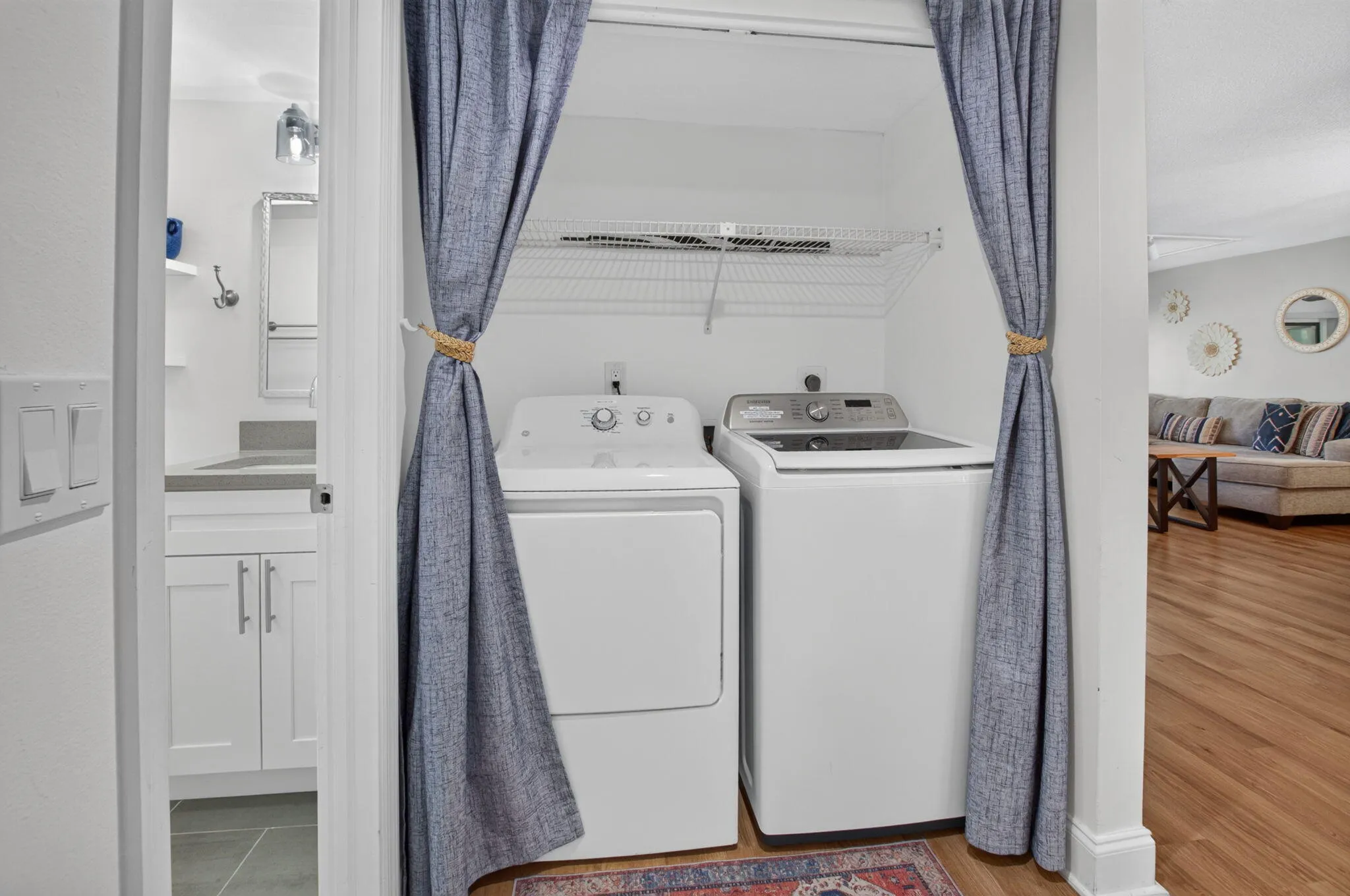 Dedicated laundry area with full-sized washer and dryer