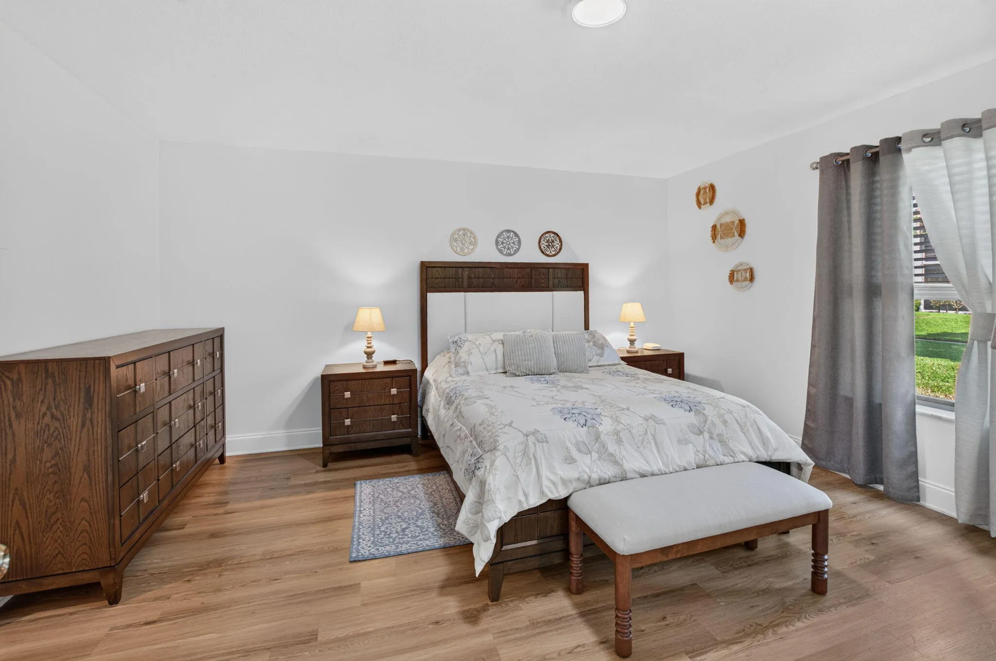 Queen sized bed, wall closet and walk-in closet