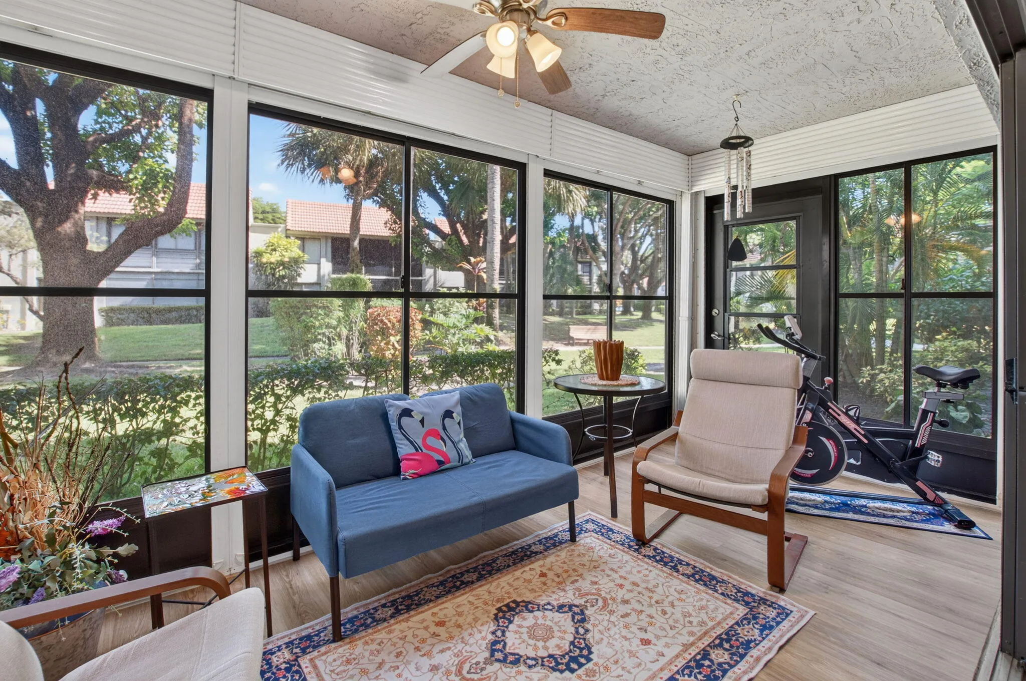Enclosed Florida Room with garden views