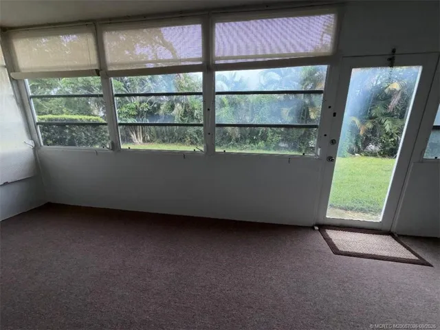 Screened porch runs along the complete back