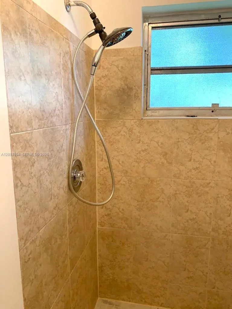 MAIN SUITE TILED SHOWER