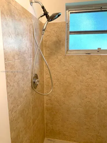 MAIN SUITE TILED SHOWER