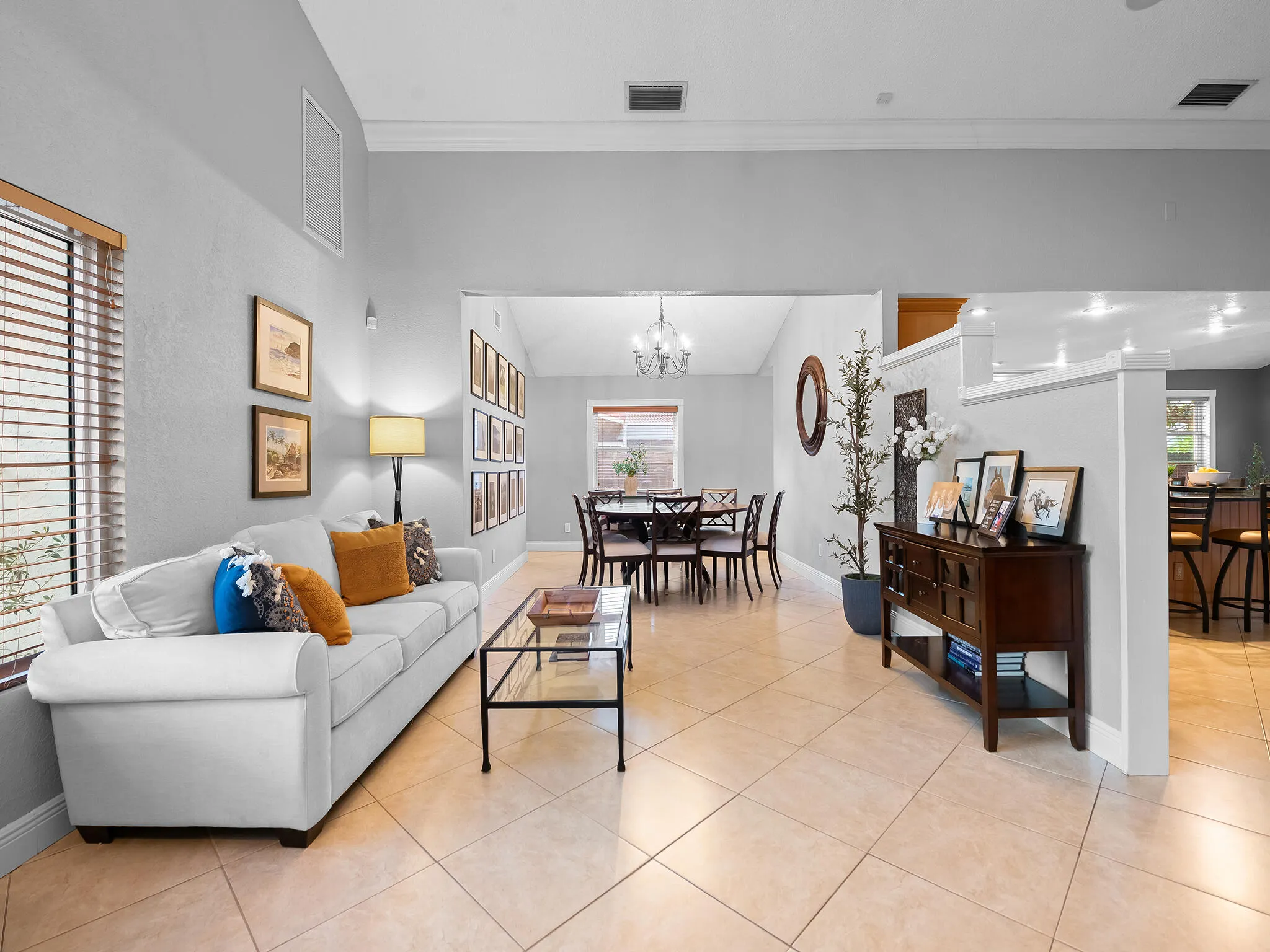 Sun soaked great room styled for entertaining.