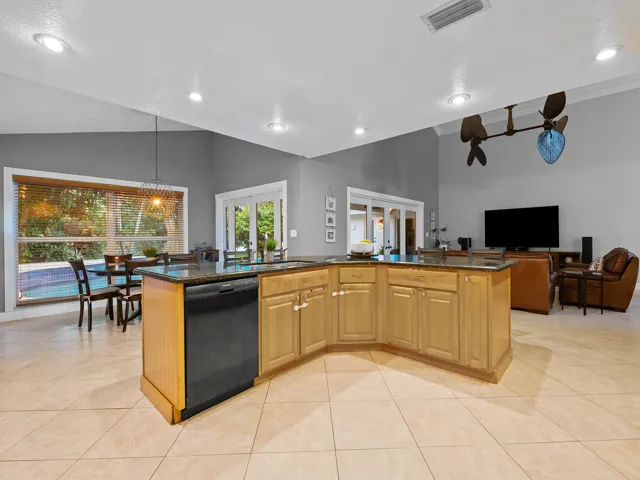 Kitchen island with open sightlines to the living area.