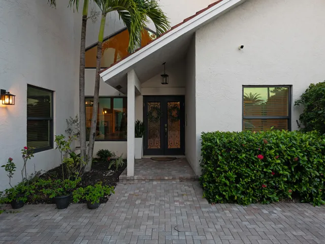 Vaulted ceilings open the heart of the home.