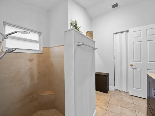 Walk in shower with designer tile.