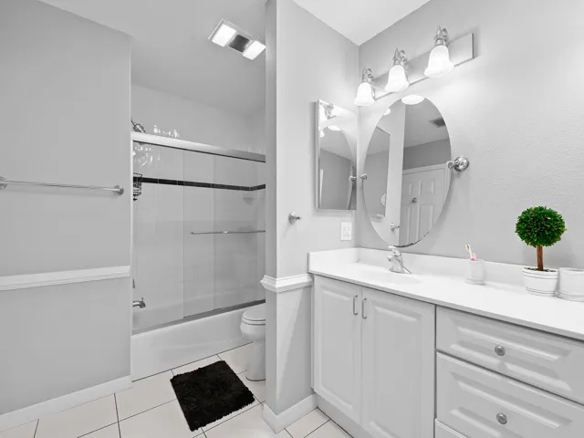 Guest bath with tub shower combo.