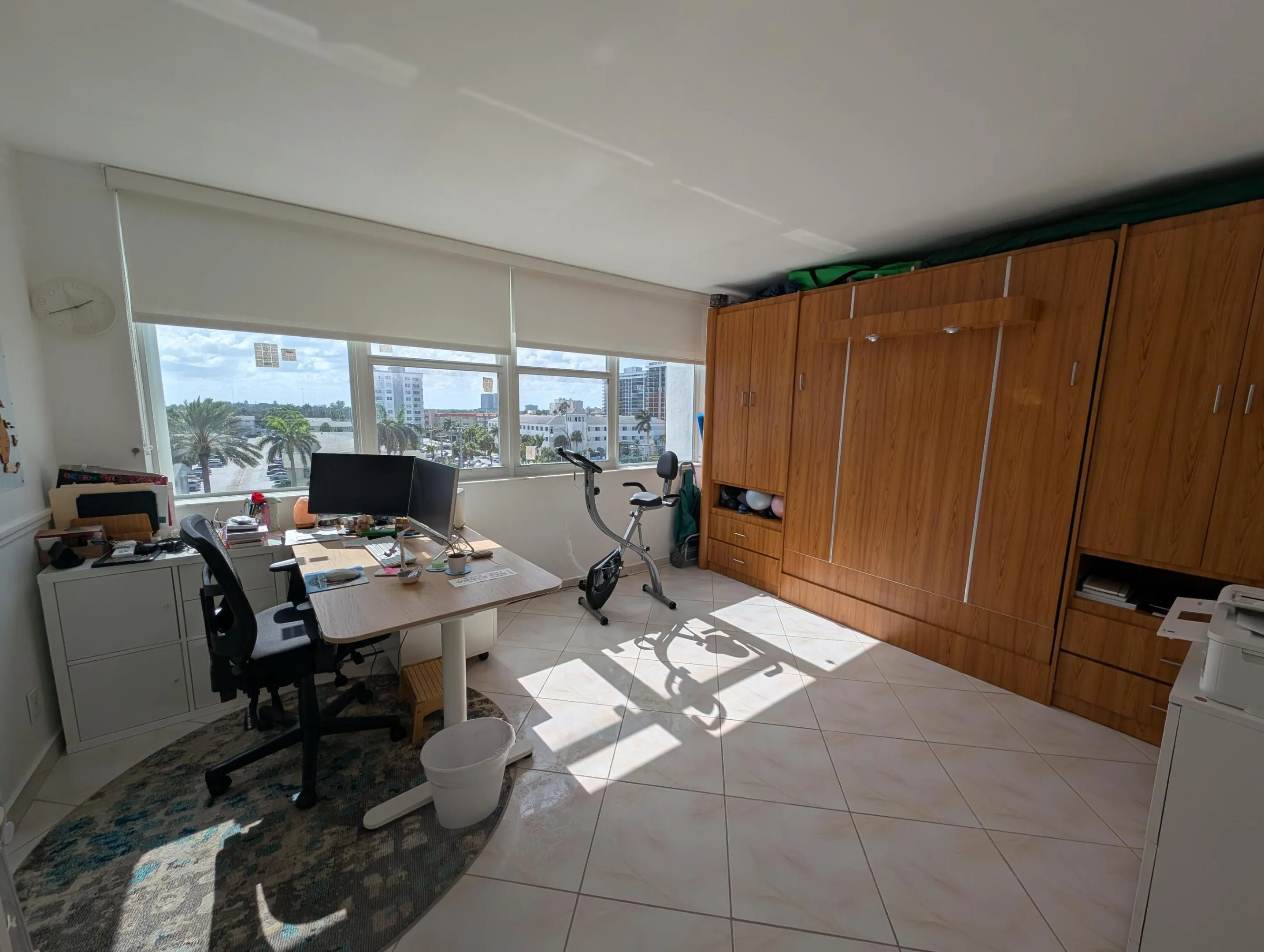 Second Bedroom featuring an office and a murphy Bed