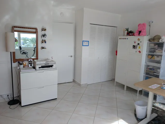 Second Bedroom featuring an office and a murphy Bed