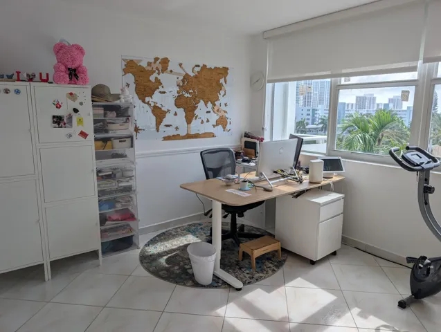 Second Bedroom featuring an office and a murphy Bed