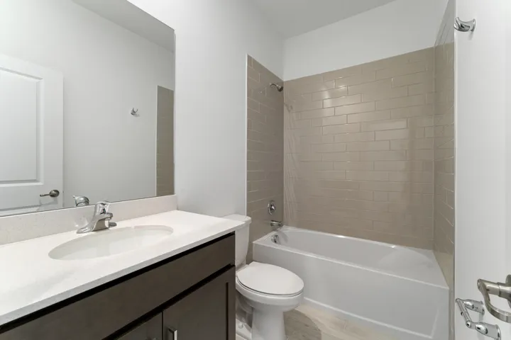 Stock photos represent builder's floorplan