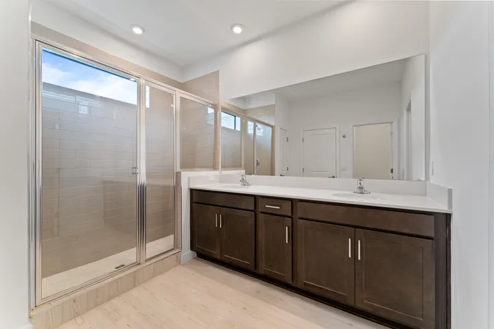 Stock photos represent builder's floorplan