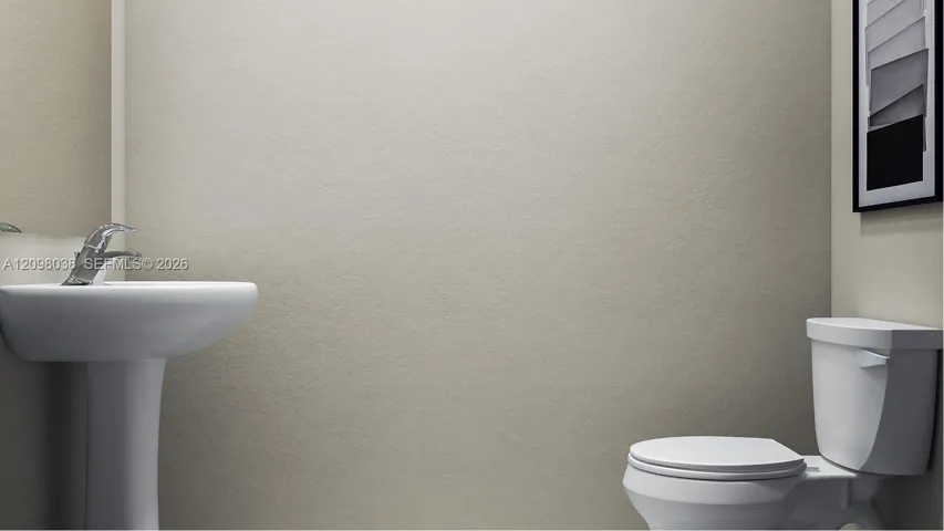 Located off the foyer is a powder room to provide easy access to residents and guests venturing throughout the first floor.