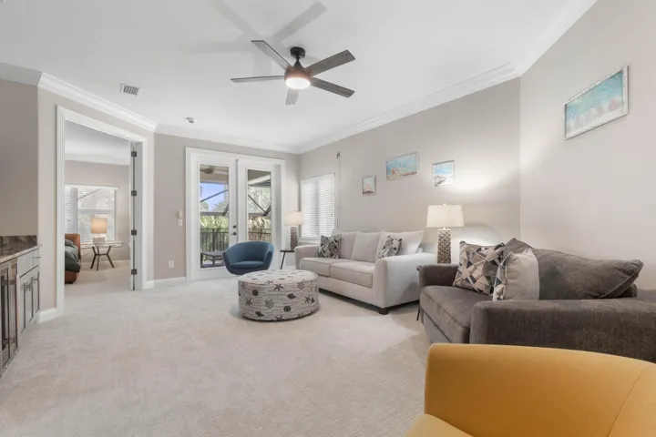 The adventure continues upstairs! This spacious game room is ready for movie nights, game days and a little friendly competition, with balcony access just steps away.