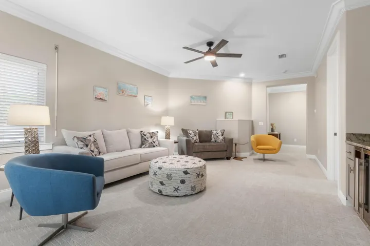 Upstairs opens to a whole new side of the home—a roomy game room where the fun can take over and everyone can claim their favorite spot.