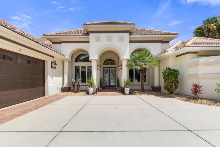 Welcome to 113 Island Estates Pkwy—come on in and discover the exceptional lifestyle waiting just beyond the front door.