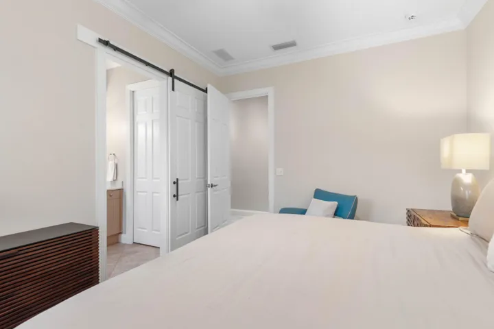 A private first-floor guest retreat with its own ensuite bath—giving overnight guests a comfortable space all their own