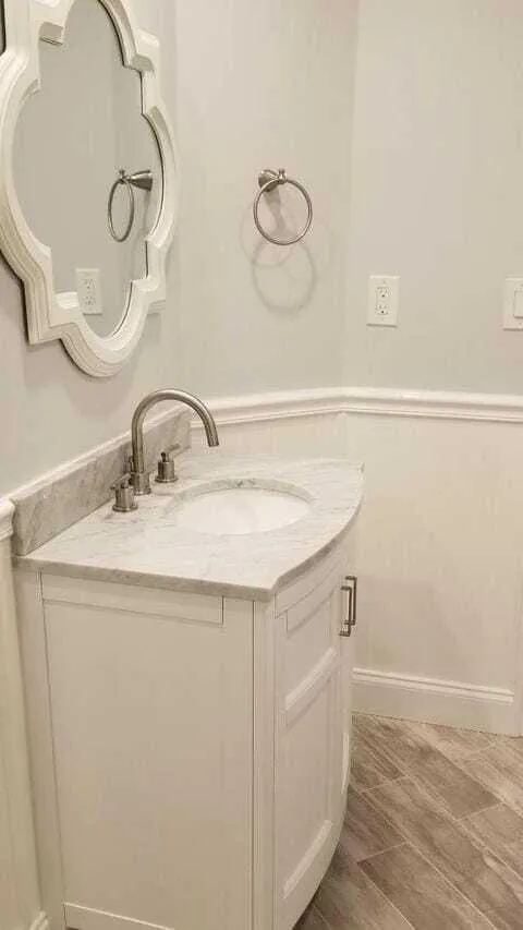 Tastefully updated bathroom with storage in vanity