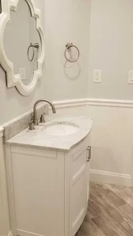 Tastefully updated bathroom with storage in vanity