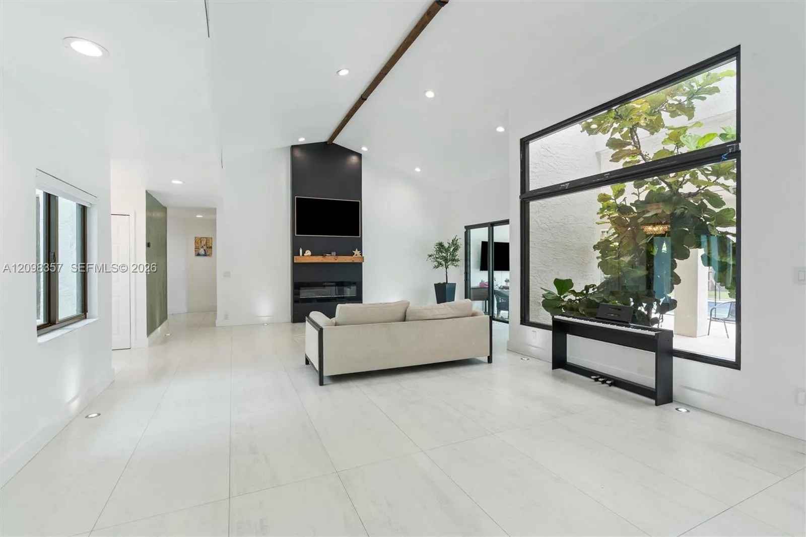 Beautiful Large Impact Window Centers the Home