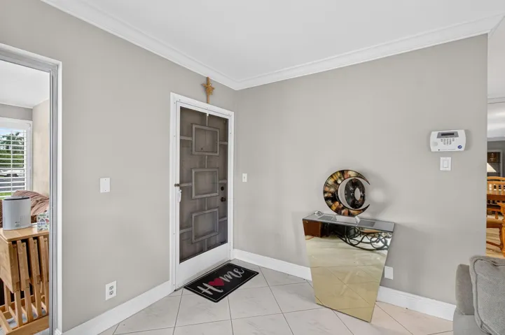 Entrance to villa interior view with scr
