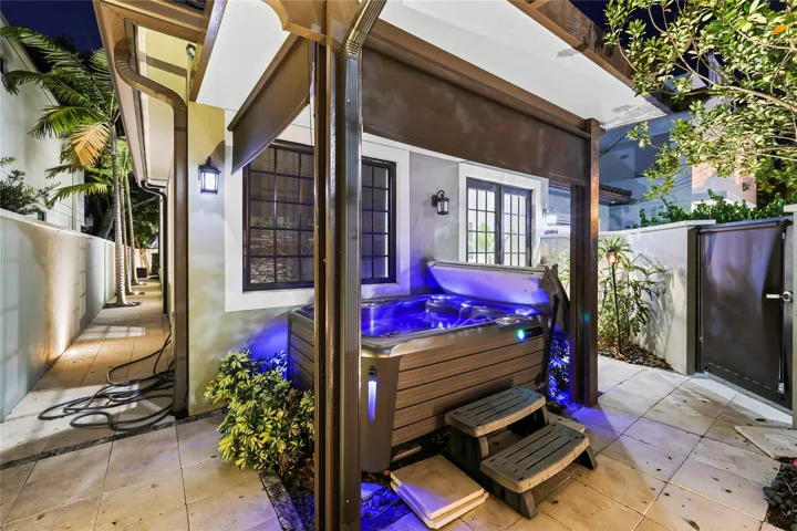 located off the primary in the back of the home, can still access from the pool