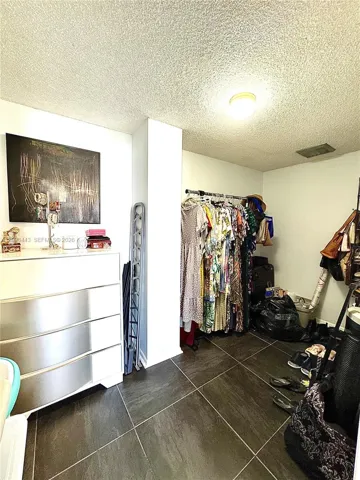 Huge walking closet, could use part of its space for anything else.