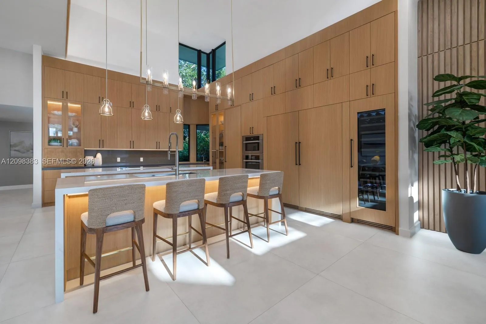 Custom luxury kitchen at 2965 Surrey Lane with Miele, Wolf, Dacor and U-Line appliances in Weston Florida.
