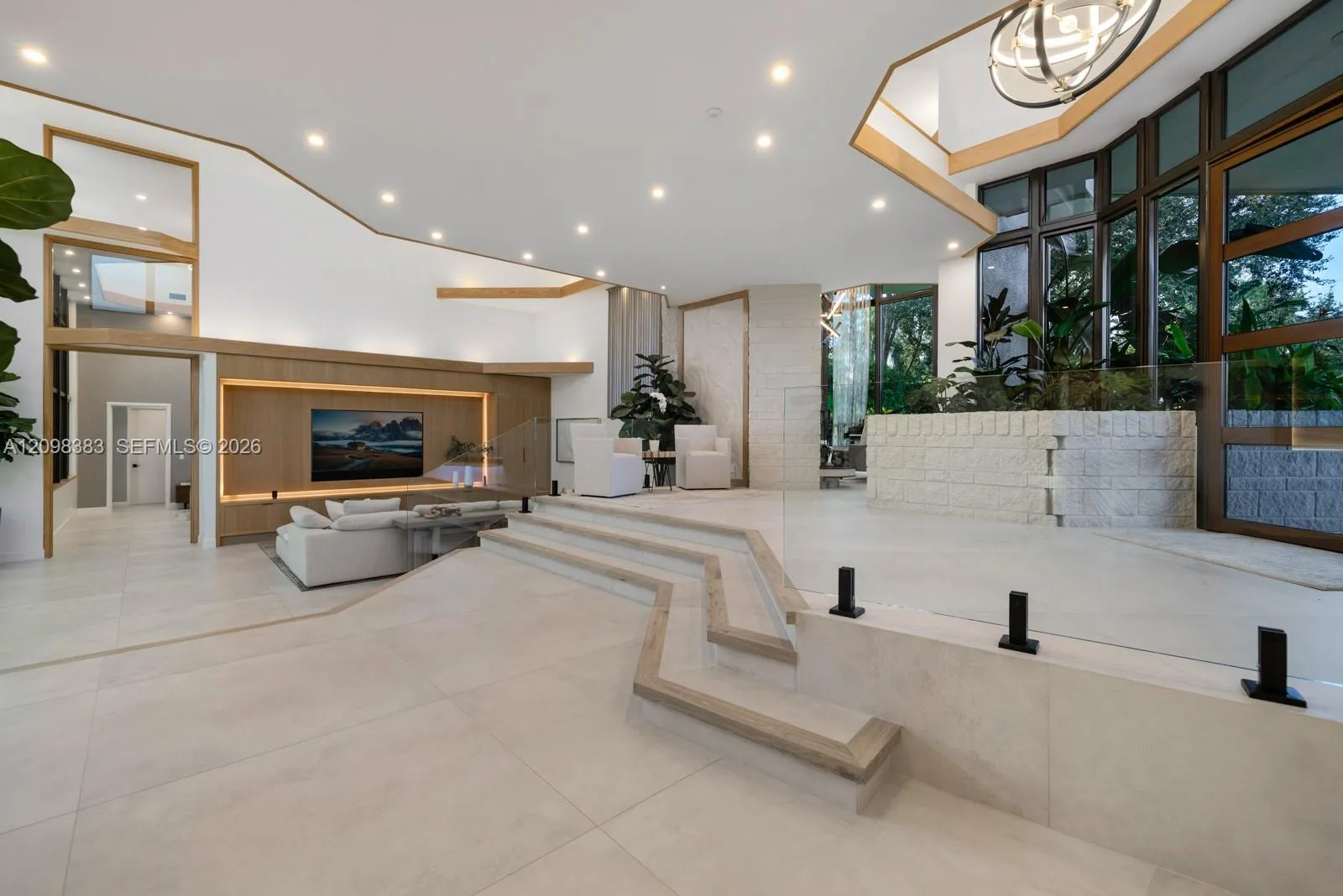 Grand entrance at 2965 Surrey Lane, a Frank Lloyd Wright-inspired luxury estate in Windmill Ranch Estates, Weston Florida.