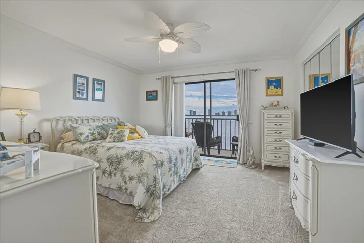 Bedroom with sliders out to balcony