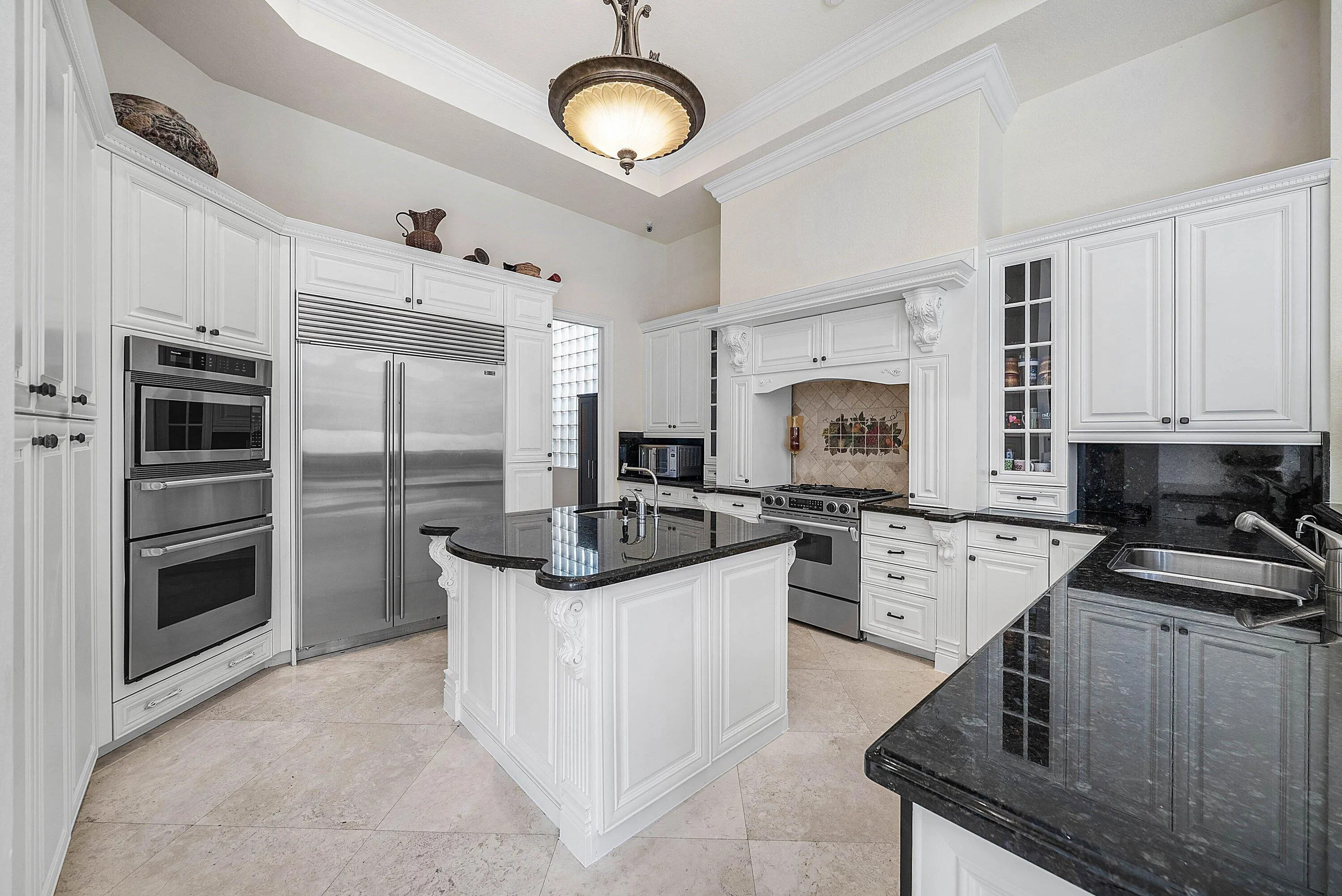 Gourmet Kitchen. Thermador Micro/Warming/Wall Oven, Sub Zero Fridge, Jenn Air Range, Marvel Wine Reserve