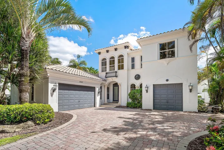 Decorative Paver Driveway with ample parking space + A Double Bay & Single Bay garage