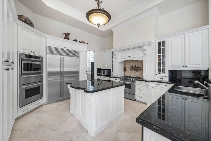 Gourmet Kitchen. Thermador Micro/Warming/Wall Oven, Sub Zero Fridge, Jenn Air Range, Marvel Wine Reserve