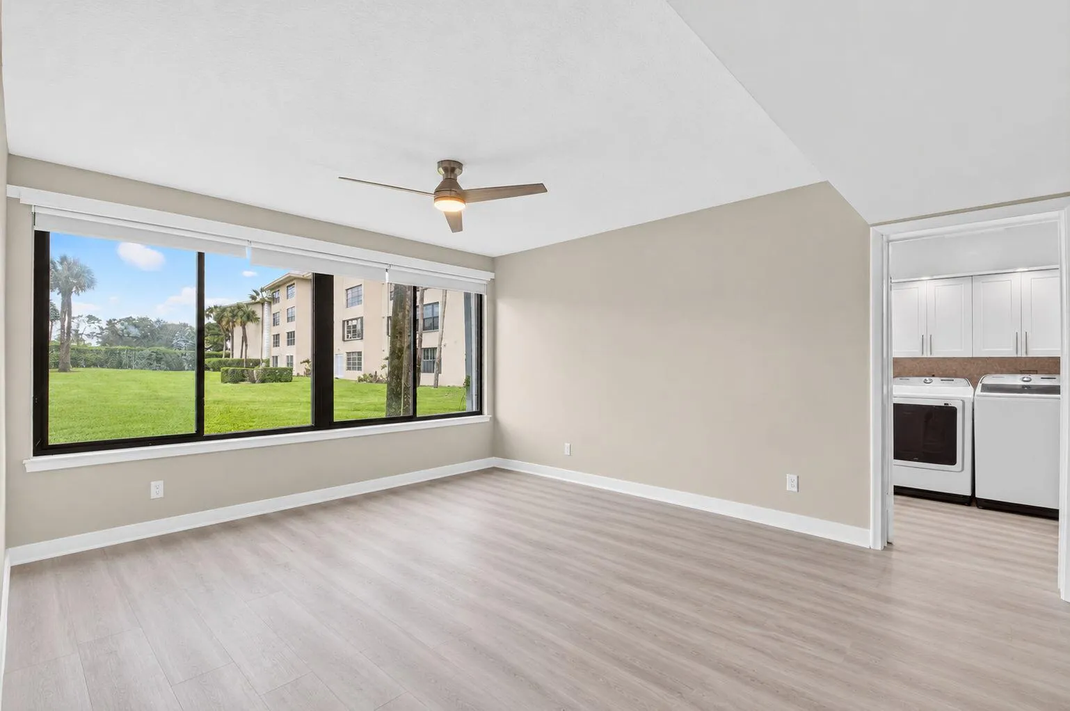 Across the hall is the mud room w/ huge storage room that could be used as an office