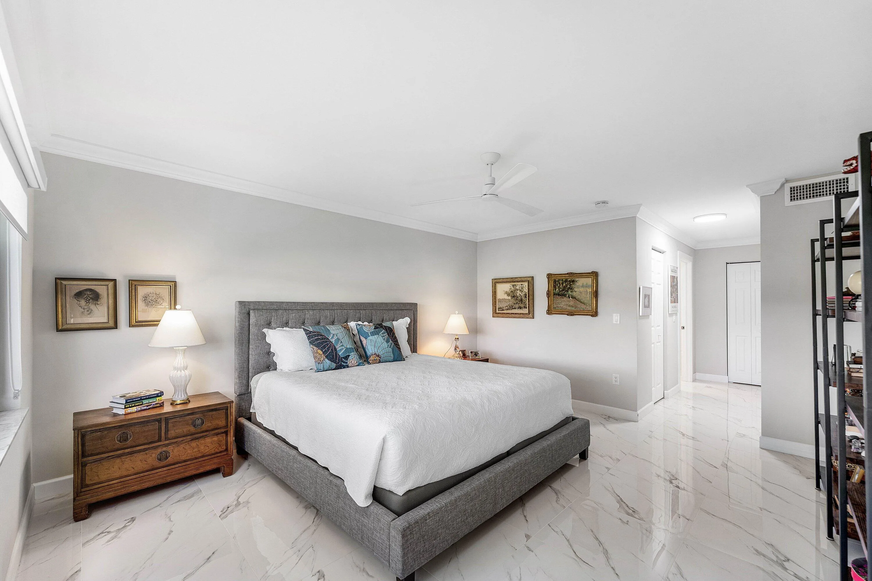 White tile flooring, crown molding, and recessed lighting