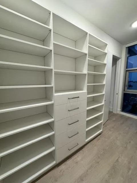 PRIMARY WALK IN CLOSET