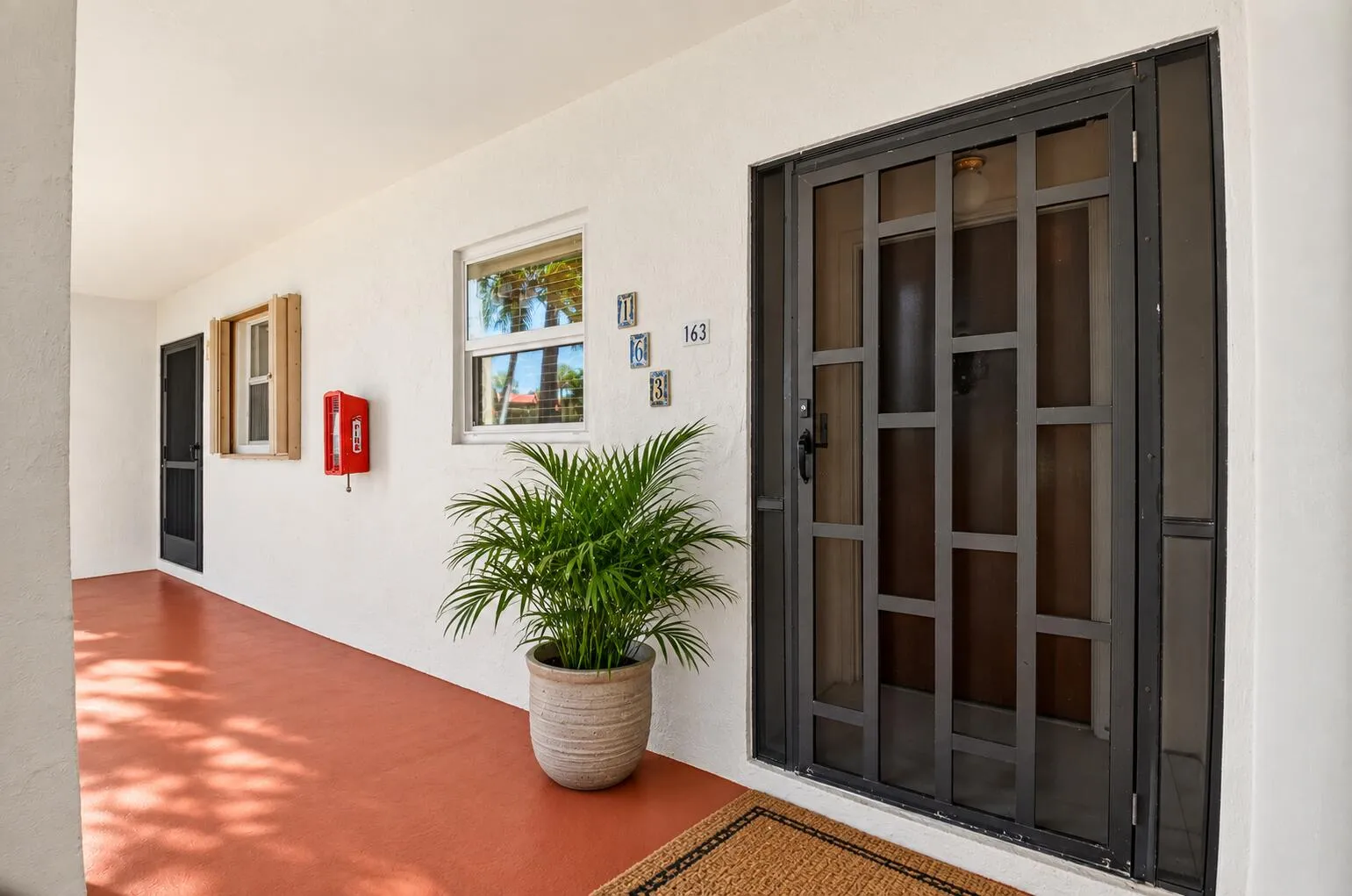 1st Floor Corner Unit, Small Screened Entry, Assigned Parking, In Unit , Laundry