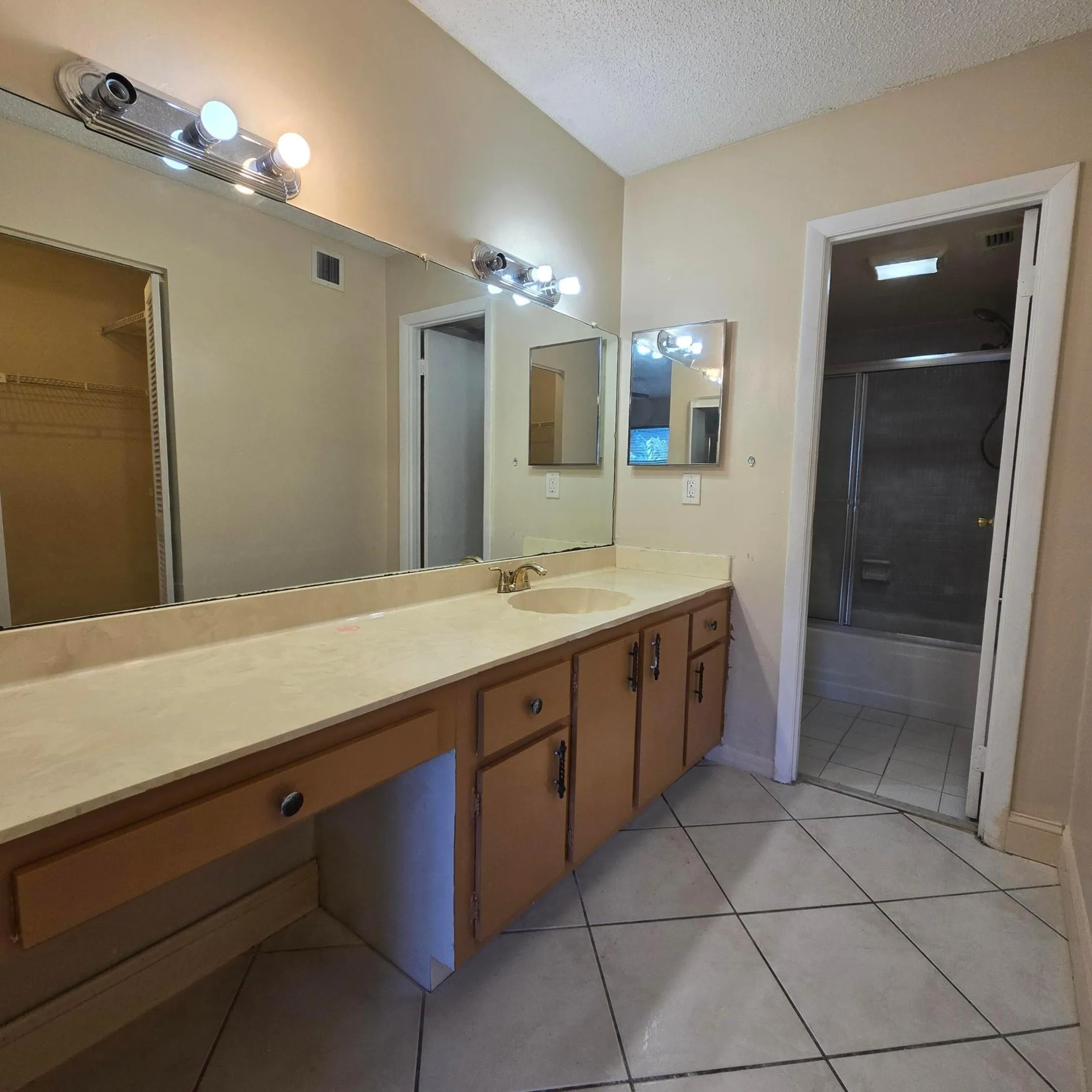 Bathroom extra long vanity and 2 medicine cabinets.