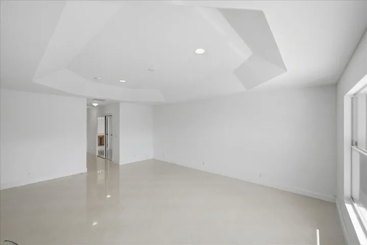 Primary Suite with tray ceilings & 2 walk-in closets