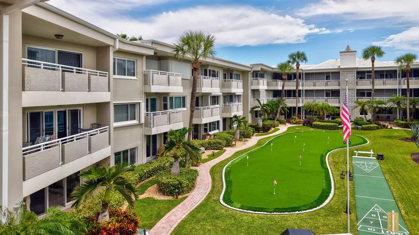 Multi-story stucco exterior with private balconies