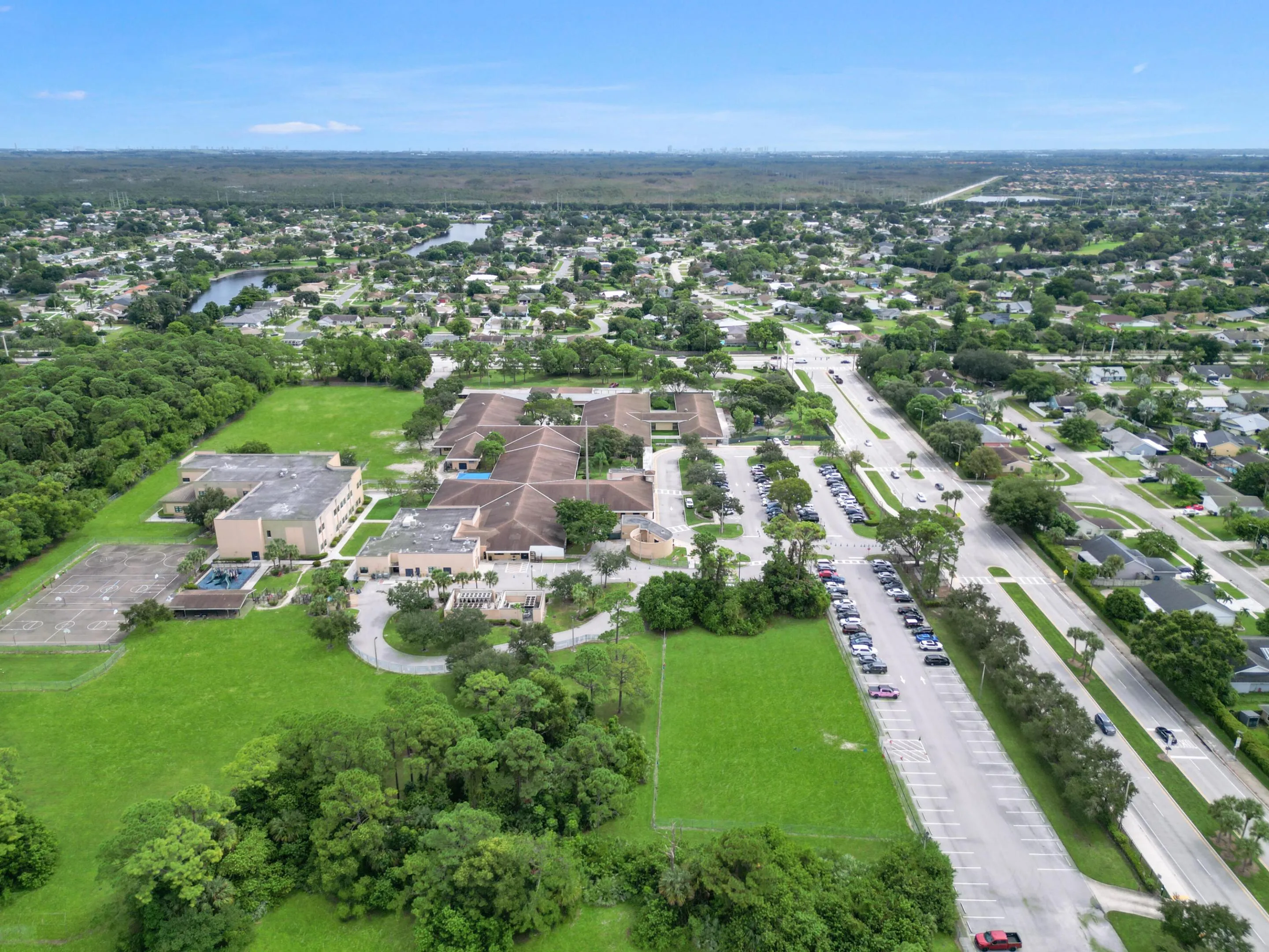 View of HL Johnson Elementary School. In the distance shows the neighborhood where the home is located.